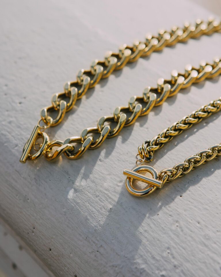 Long necklace with large gold link
