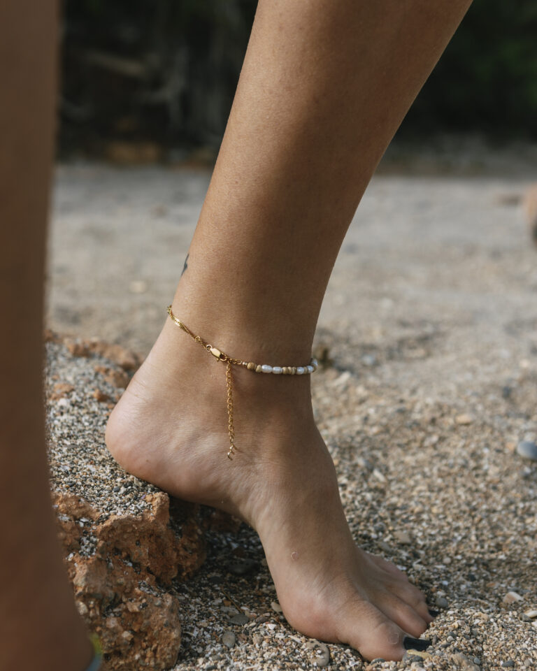 Gold anklet with wooden beads