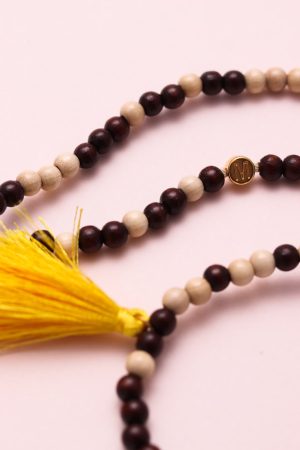 Wooden glasses cord with a yellow pompom